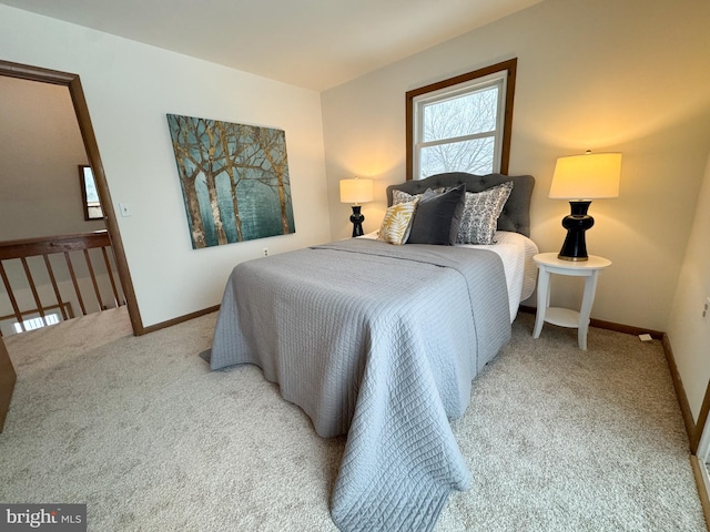 bedroom with light carpet