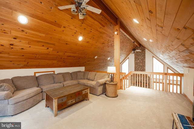 carpeted living room featuring ceiling fan, wooden walls, wood ceiling, and lofted ceiling