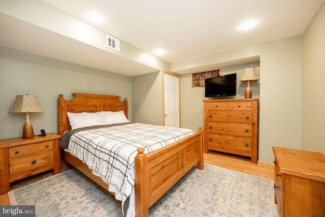 bedroom featuring light wood-type flooring