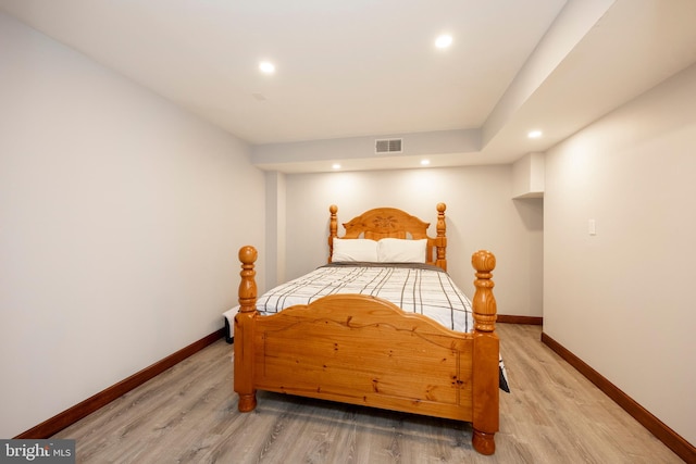 bedroom featuring wood-type flooring