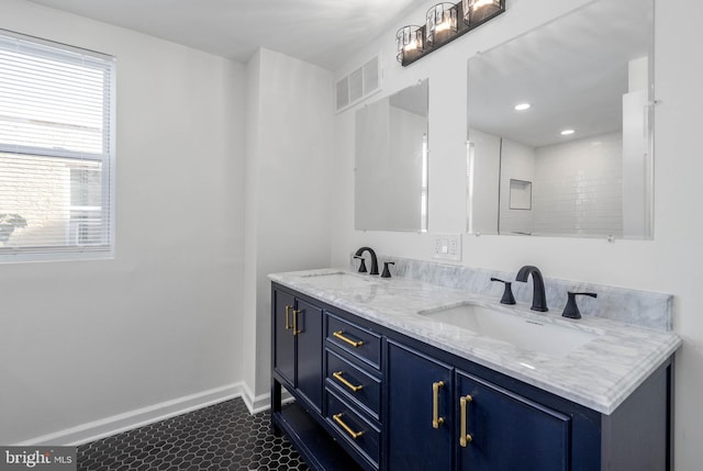 bathroom featuring tile patterned floors and vanity