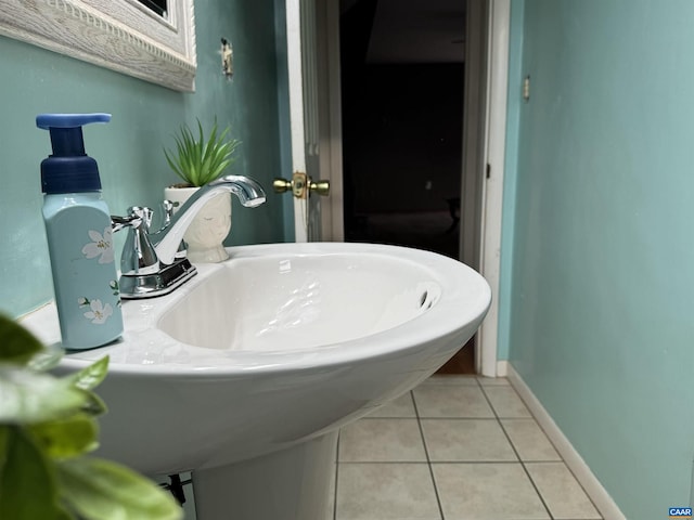 bathroom with tile patterned floors