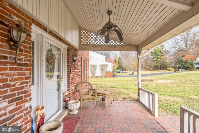 view of patio / terrace featuring ceiling fan