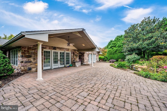 view of patio featuring french doors and ceiling fan