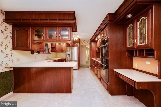 bar featuring ceiling fan, stainless steel fridge, crown molding, and sink