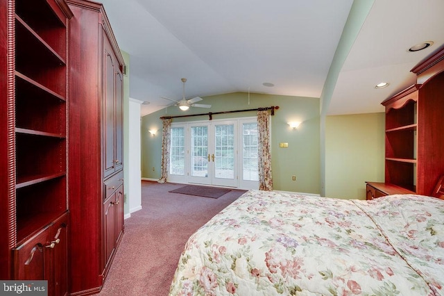 carpeted bedroom with ceiling fan, french doors, and lofted ceiling