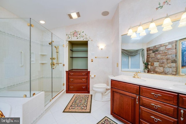 full bathroom with separate shower and tub, tile patterned floors, lofted ceiling, toilet, and vanity