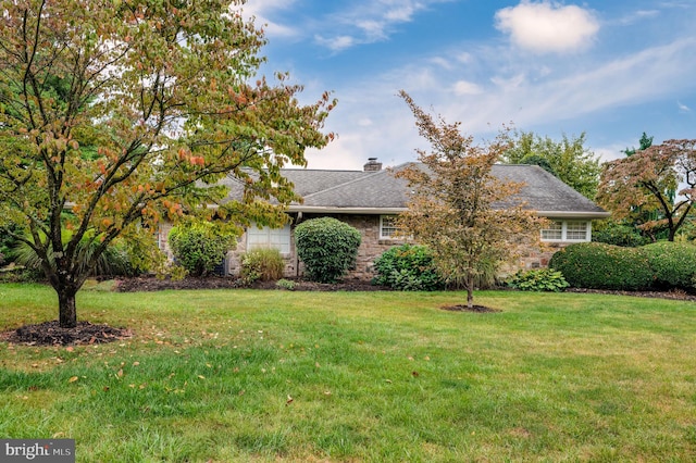 exterior space with a yard