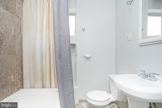 bathroom with sink and toilet