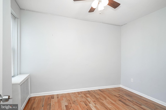 empty room featuring wood-type flooring