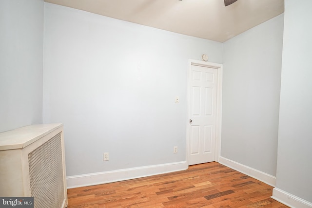 spare room featuring light wood-type flooring