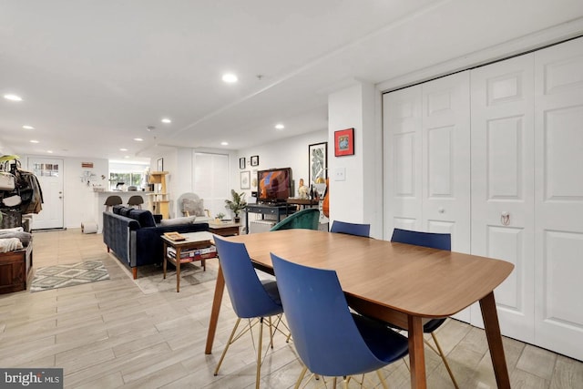 dining area with light wood-type flooring