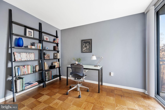 office area with light parquet floors