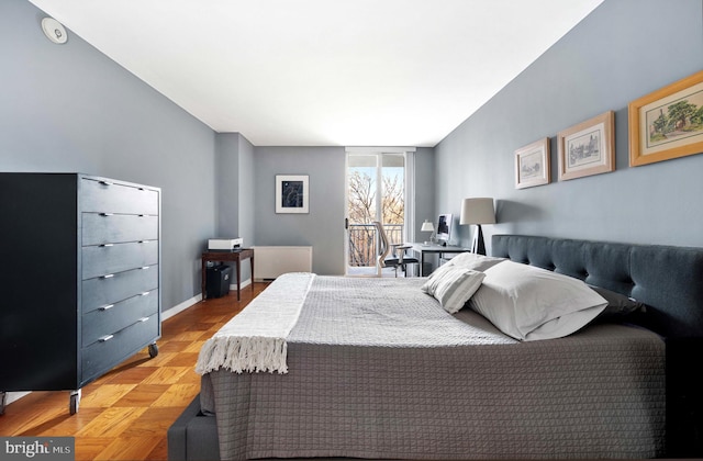 bedroom with parquet flooring