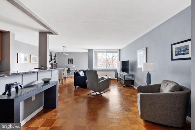 living room with parquet flooring