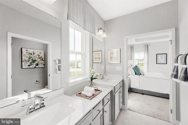 bathroom with vanity and tile patterned floors