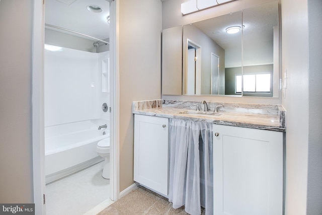 full bathroom featuring shower / washtub combination, vanity, a textured ceiling, and toilet