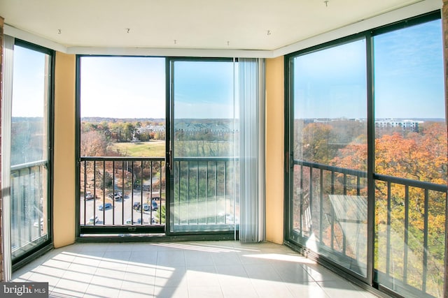 5901 Mount Eagle Dr Unit 1101, Alexandria, VA 22303 - unfurnished sunroom featuring tile patterned flooring and floor to ceiling windows