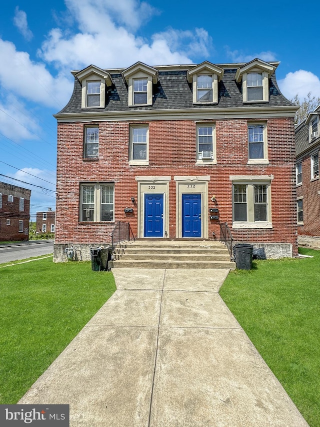 view of front of home with a front yard