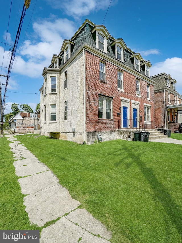 exterior space with a lawn