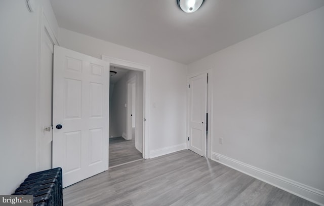 unfurnished bedroom featuring light hardwood / wood-style flooring