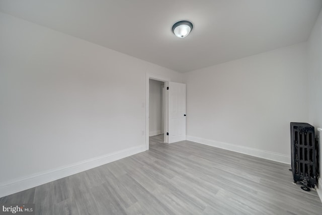 empty room with light wood-type flooring