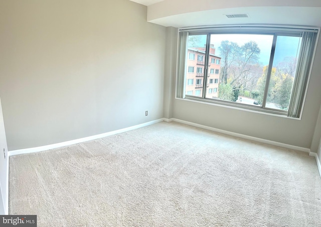 view of carpeted spare room