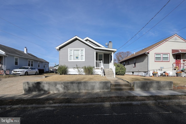 bungalow-style home featuring a porch