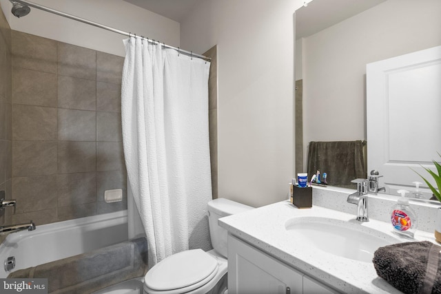 full bathroom featuring vanity, shower / bathtub combination with curtain, and toilet