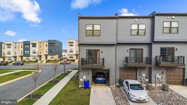 back of house featuring central AC unit