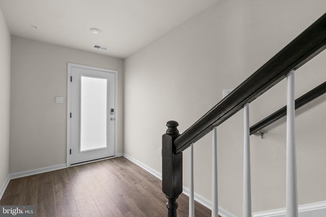 entrance foyer featuring hardwood / wood-style floors