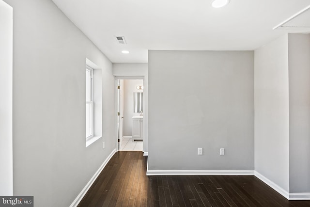 interior space with dark hardwood / wood-style floors