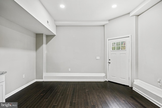 interior space with dark hardwood / wood-style flooring