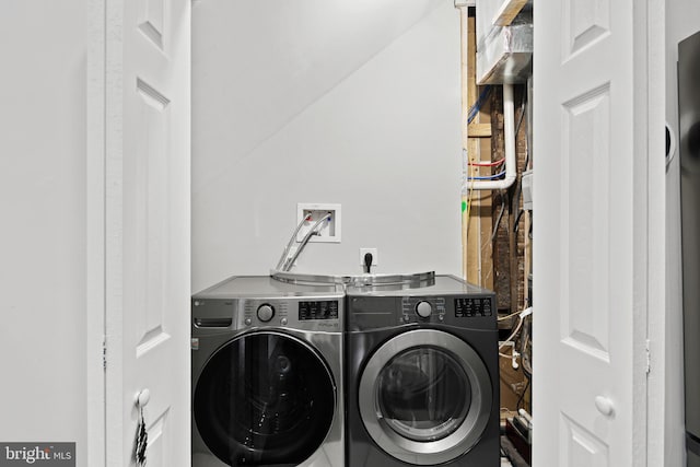 laundry room with washer and clothes dryer