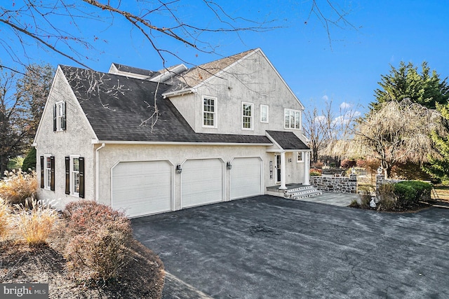 view of property exterior featuring a garage