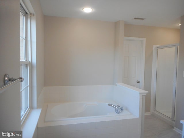 bathroom with plus walk in shower