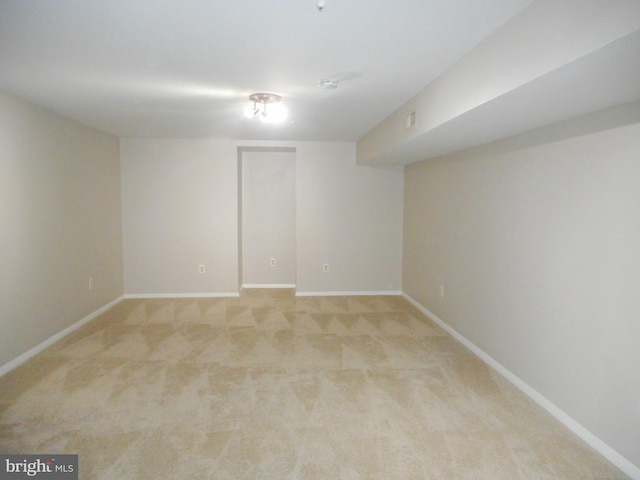 basement with light colored carpet