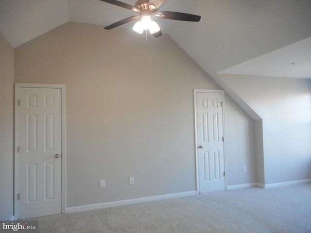 bonus room featuring light carpet, vaulted ceiling, and ceiling fan