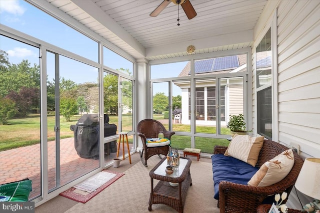 sunroom / solarium with ceiling fan