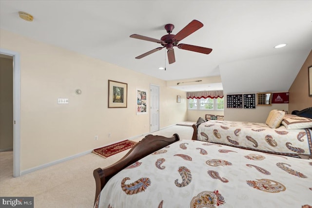 bedroom featuring ceiling fan and light carpet