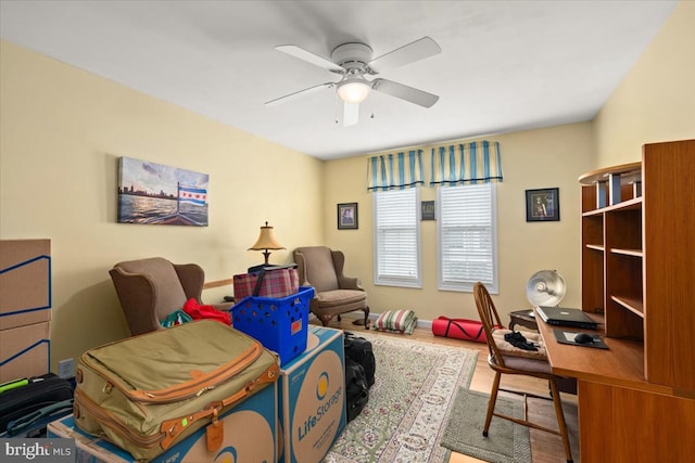 office featuring hardwood / wood-style flooring and ceiling fan