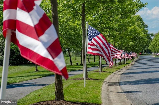 surrounding community with a lawn