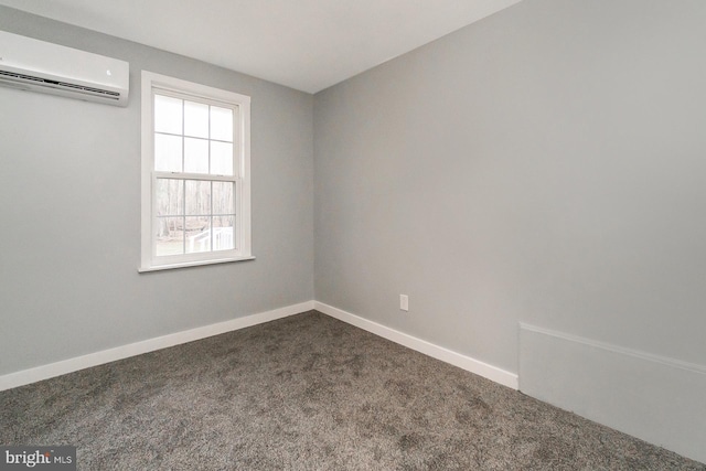 carpeted empty room with a wall unit AC