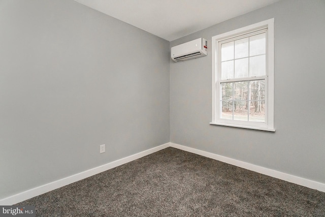 carpeted spare room featuring a wall mounted AC