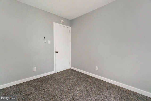 spare room with carpet floors