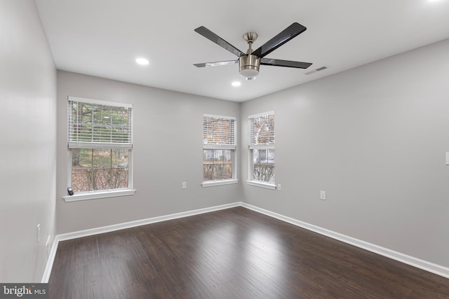 empty room with hardwood / wood-style flooring and ceiling fan