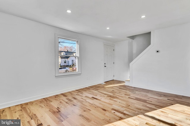 empty room with light wood-type flooring