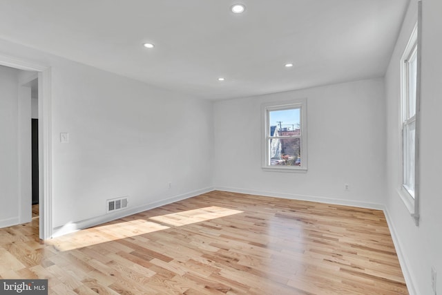 empty room featuring light hardwood / wood-style floors