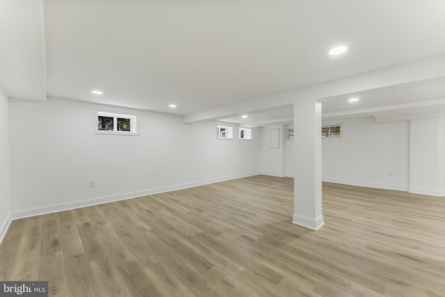 basement featuring light wood-type flooring