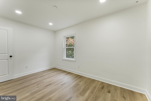 unfurnished room featuring light hardwood / wood-style flooring